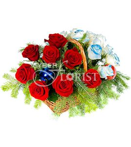 Two parts. Exquisite basket of roses that combines the contrast of blue and red flowers in a jolly Christmassy decoration.